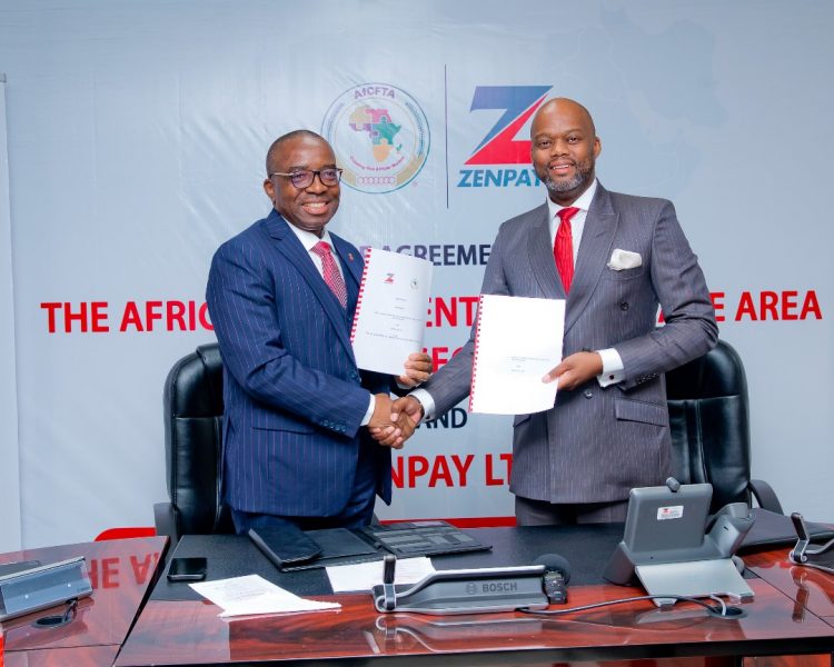 L-R: Chairman of Zenpay Limited, Dr. Ebenezer Onyeagwu and the Secretary-General of the African Continental Free Trade Area (AfCFTA) Secretariat, His Excellency Wamkele Mene, during the signing of an agreement for the development and deployment of the SMARTAfCFTA Portal to facilitate trade within the African continent, at Zenith Bank Headquarters, Ajose Adeogun Street, Victoria Island, Lagos on Friday.